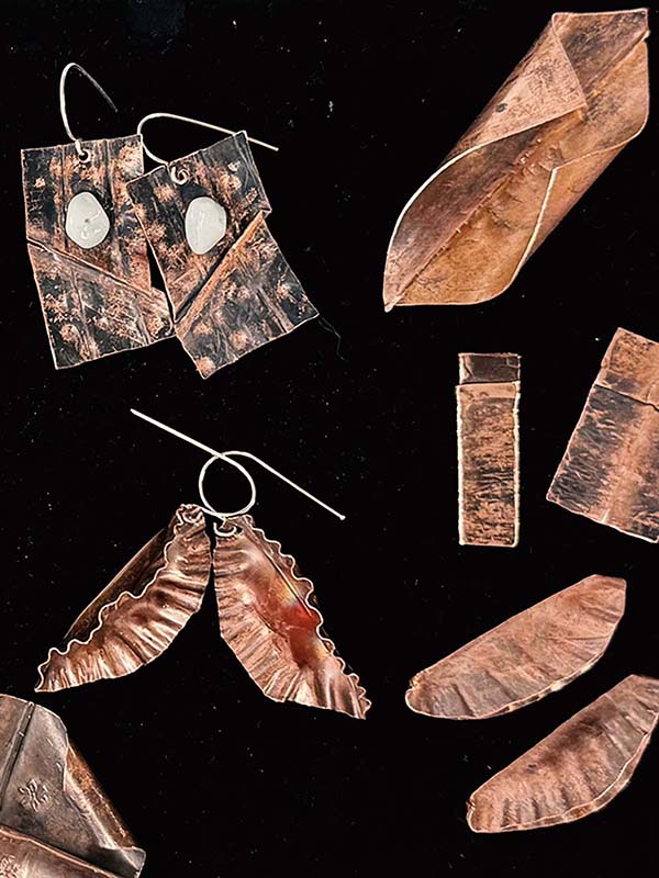 Array of copper fold-formed earrings created in a class at the Somerset Artists' Co-Op in Somerset, Ohio.