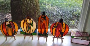 Stained glass pumpkins and small box created in the Tiffany style at Somerset Artists' Co-Op in Somerset, Ohio.