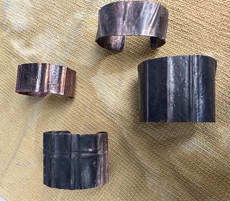 Array of four cuff bracelets created in a form folding copper class at the Somerset Artists' Co-Op in Somerset, Ohio