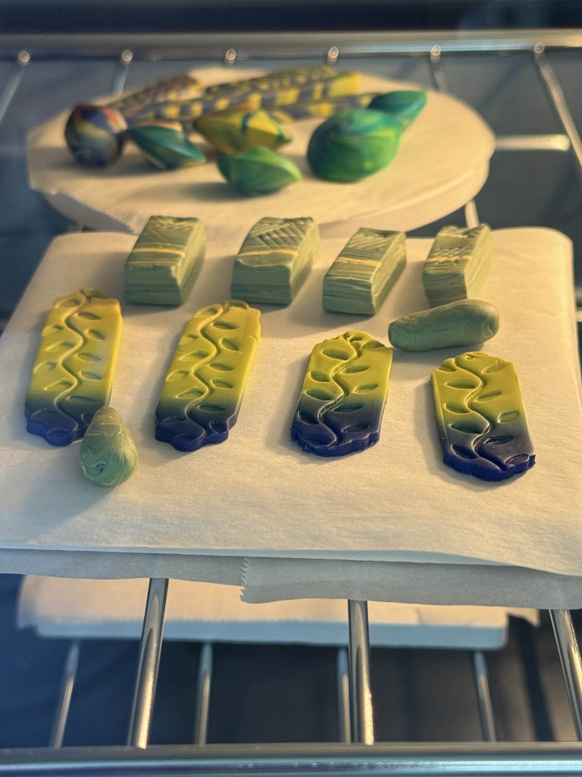 Student polymer clay pieces curing in the oven at the Somerset Artists Co-Op.