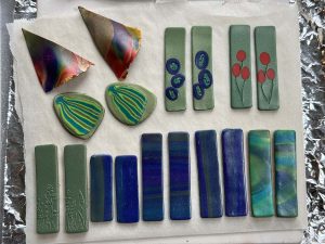 Array of polymer clay earrings prior to baking.