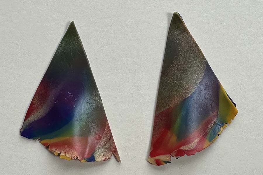 Polymer clay wavy form earrings prior to baking.