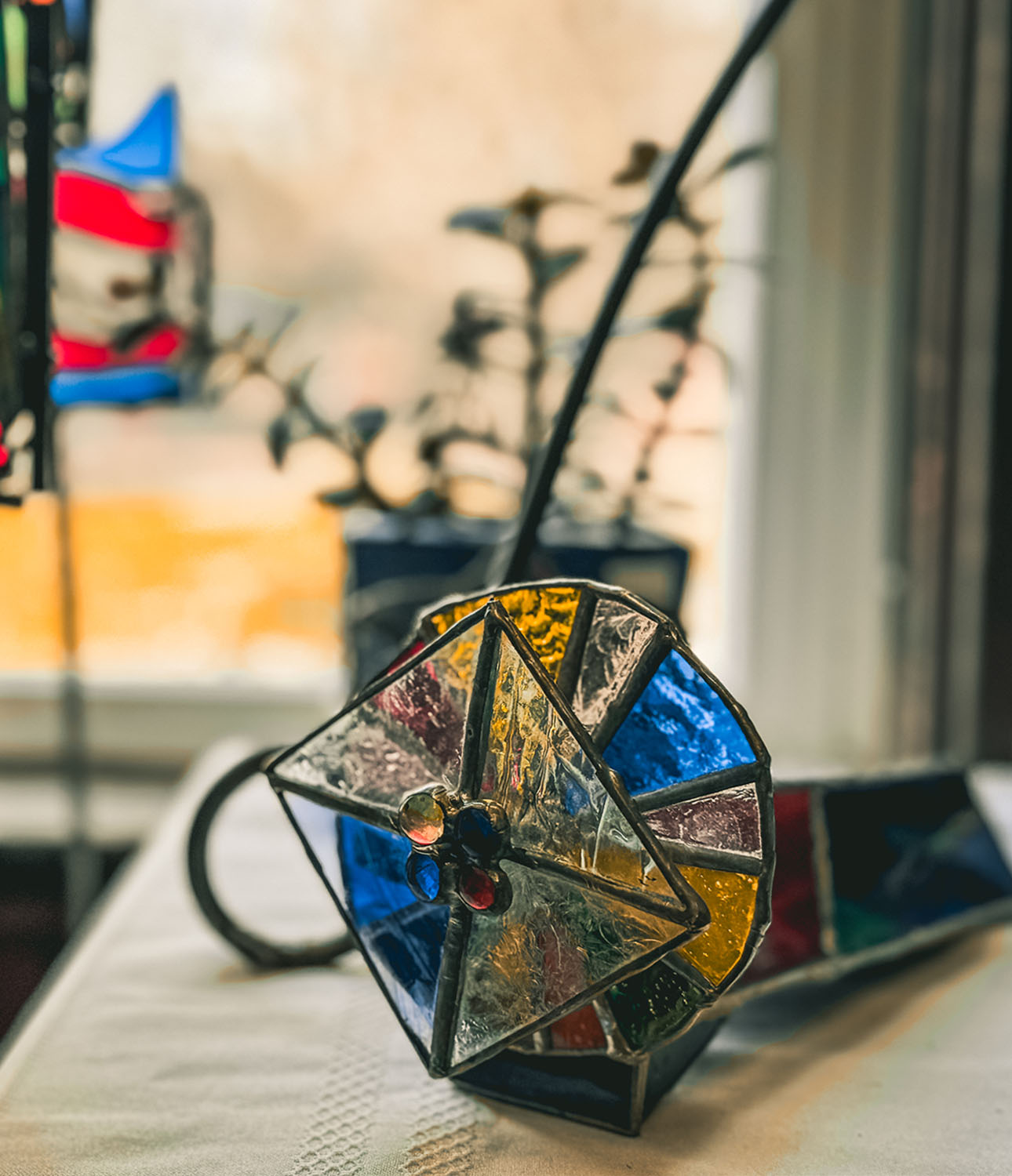 Stained glass kaleidoscope made by Jane Kunkler, instructor in Tiffany-style stained glass at the Somerset Artists' Co-Op in Somerset, Ohio.