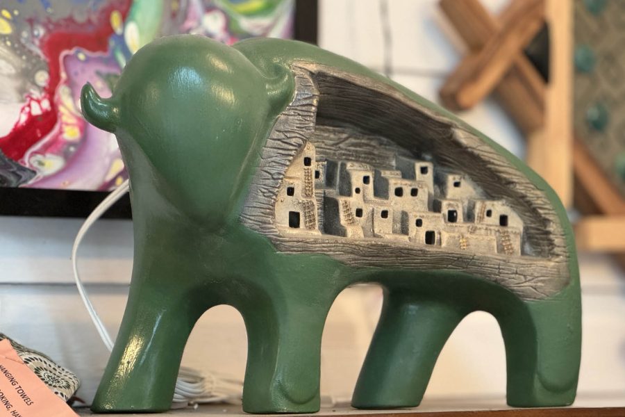 Carved ceramic bull with city inside its body cavity on display at the Somerset Artists' Co-Op..