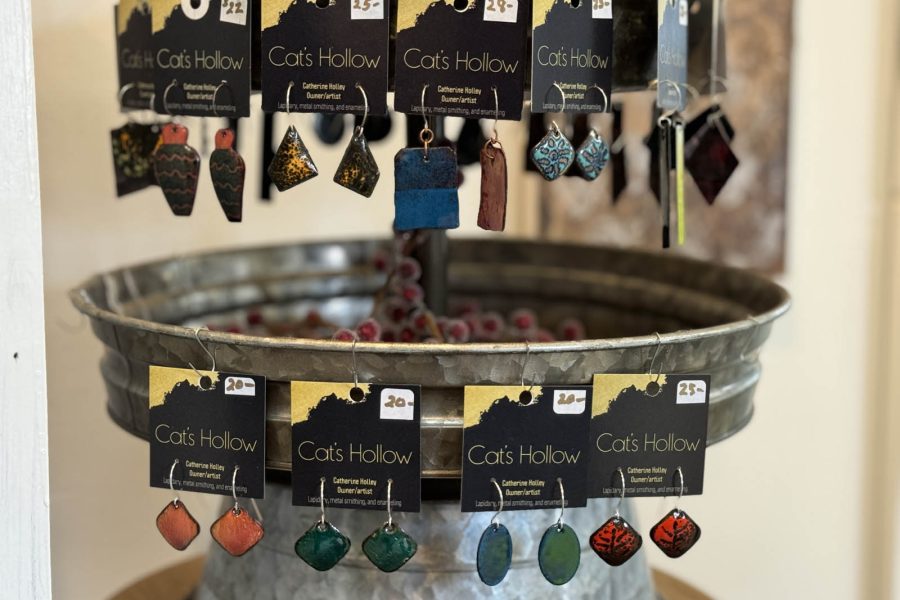 Display of copper enameled earrings created by Cathy Holley Somerset Artists' Co-Op.