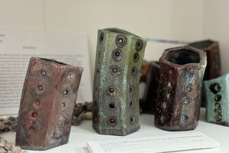 Curved ceramic tea light holders by Ariel Jovan Swartz at the Somerset Artists' Co-Op.