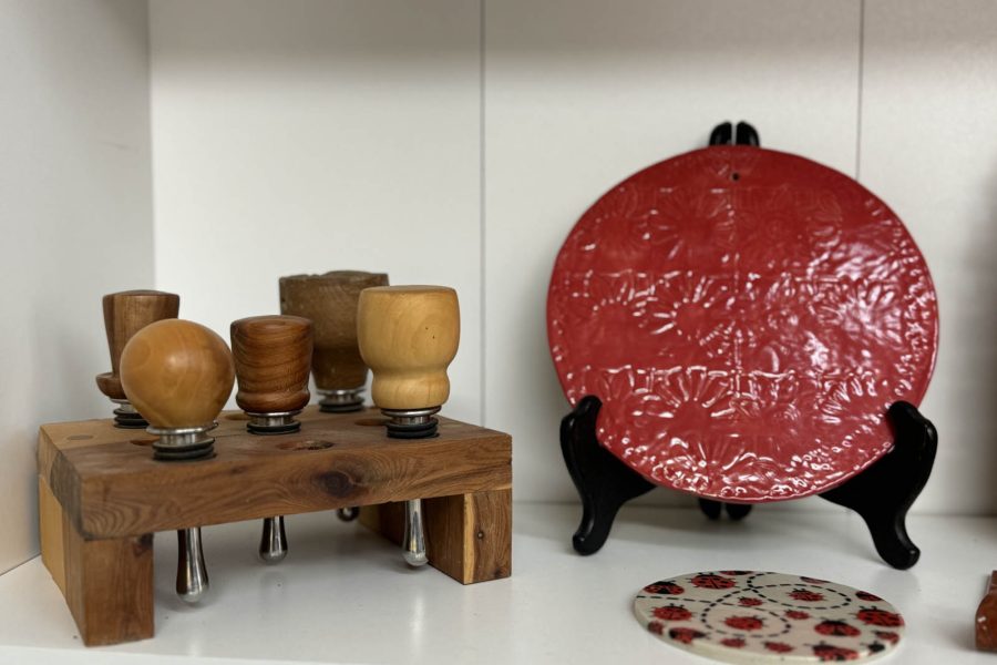 Display of ceramic cups and decorative plates at the Somerset Artists' Co-Op.