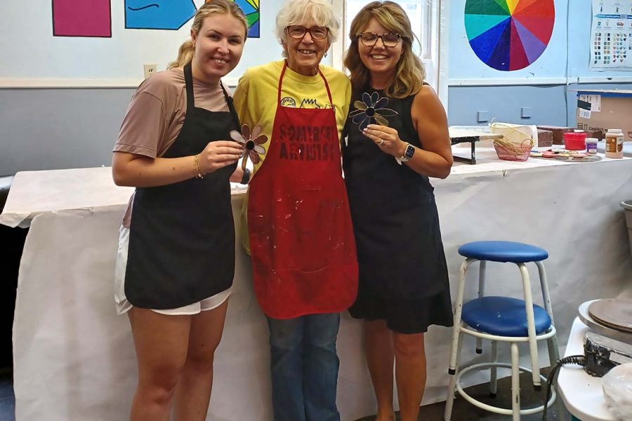 Tiffany-style stained glass instructor Jane Kunkler and two students in the studio at the Somerset Artists' Co-Op in Somerset, Ohio.