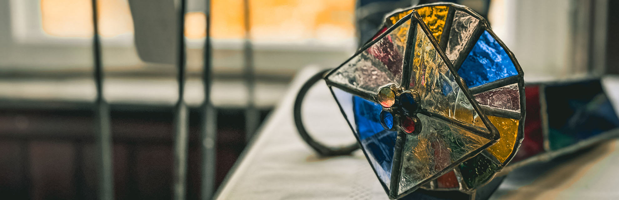 Stained glass kaleidoscope made by Jane Kunkler, instructor in Tiffany-style stained glass at the Somerset Artists' Co-Op in Somerset, Ohio.