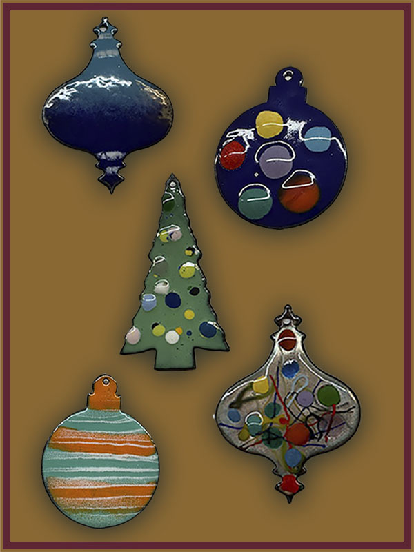 Selection of colorful holiday ornaments created with glass enameling at the Somerset Artists' Co-Op in Somerset, Ohio.